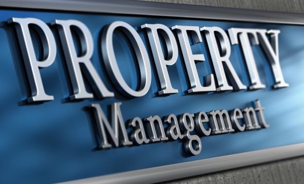 A sign stating 'property management' - Express Capital Financing