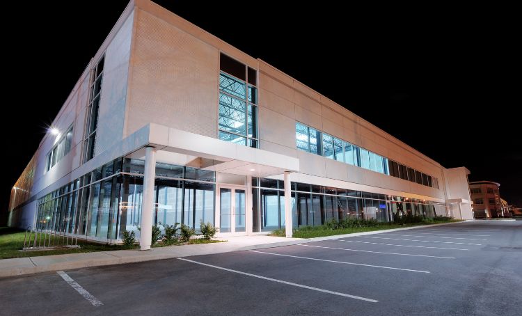 A commercial real estate building at night - Express Capital Financing