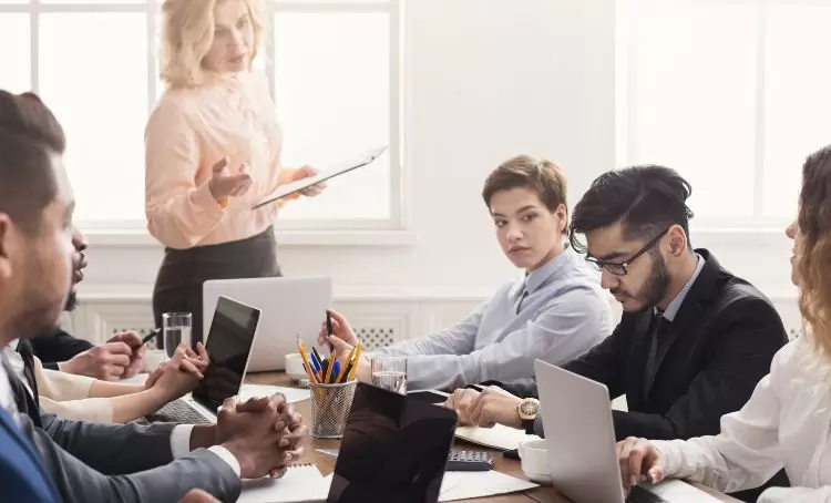 a group in a boardroom - common financing mistakes