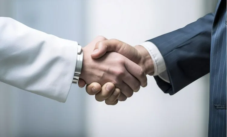 A property investory qualifying for a DSCR loan and shaking with the loan officer - Express Capital Financing