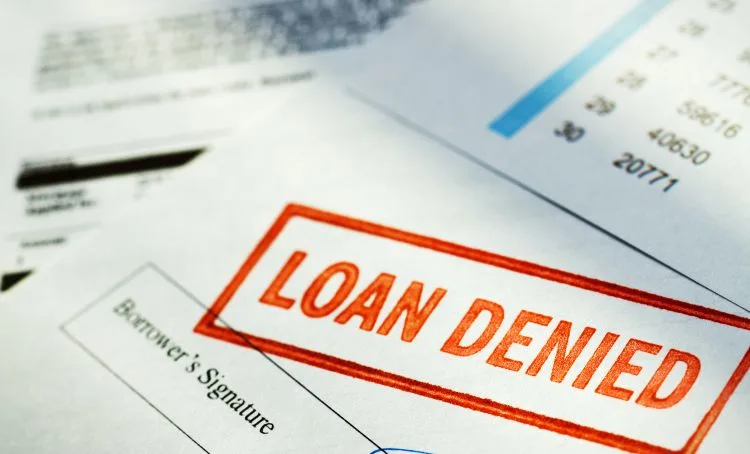 A DSCR loan applications with a 'denied' stamp on it - Express Capital Financing