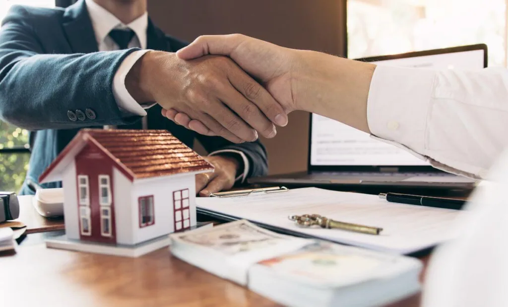 Property investors shaking hands - Volatility of market rates - Express Capital Financing