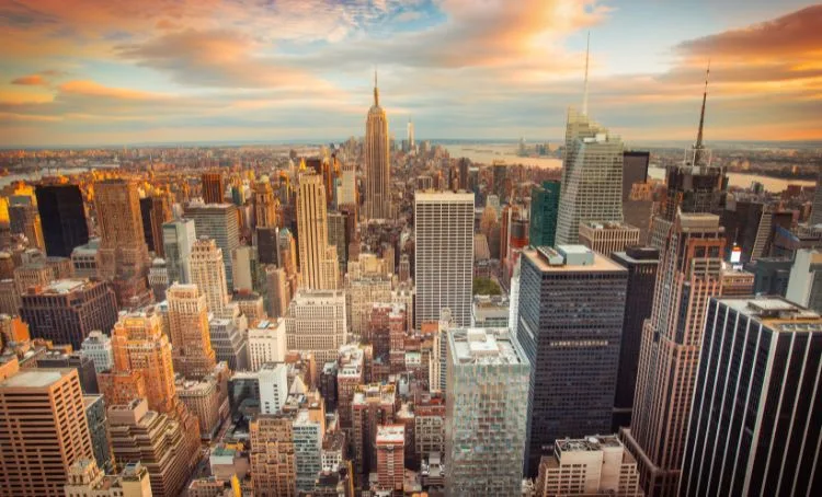 A bird's eye view of Manhattan in New York as sunset begins - Express Capital FInancing